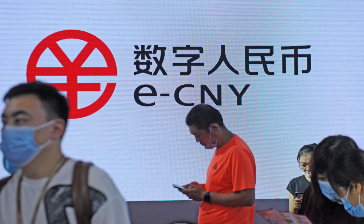 <i>ป้ายโฆษณา e-CNY ในประเทศจีน<br>รูปภาพ:&nbsp;Lyu Wenzheng/China Daily</i>